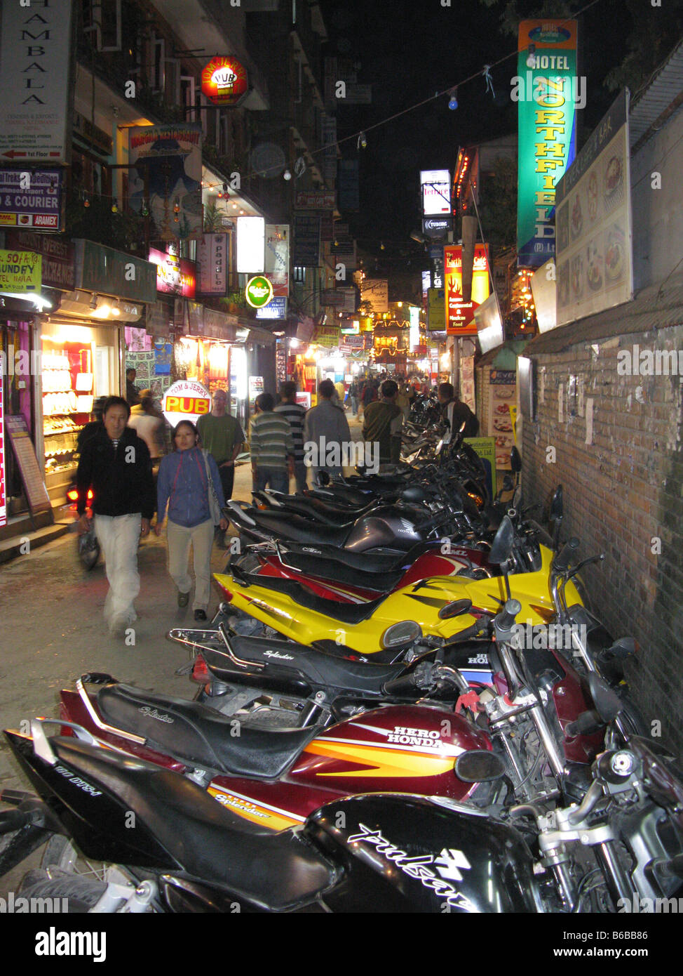 Motorbikes parked outside Northfield, a popular hotel and nightspot in Thamel, Kathmandu, Bagmati, Himalayas, Nepal, Asia Stock Photo