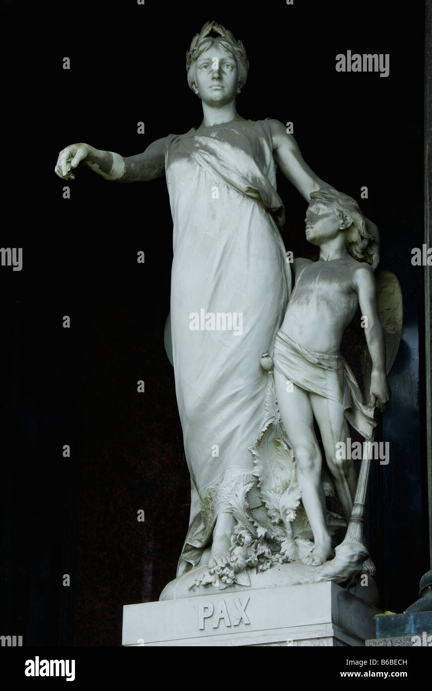 tomb monument with woman and child with downturned torch Stock Photo
