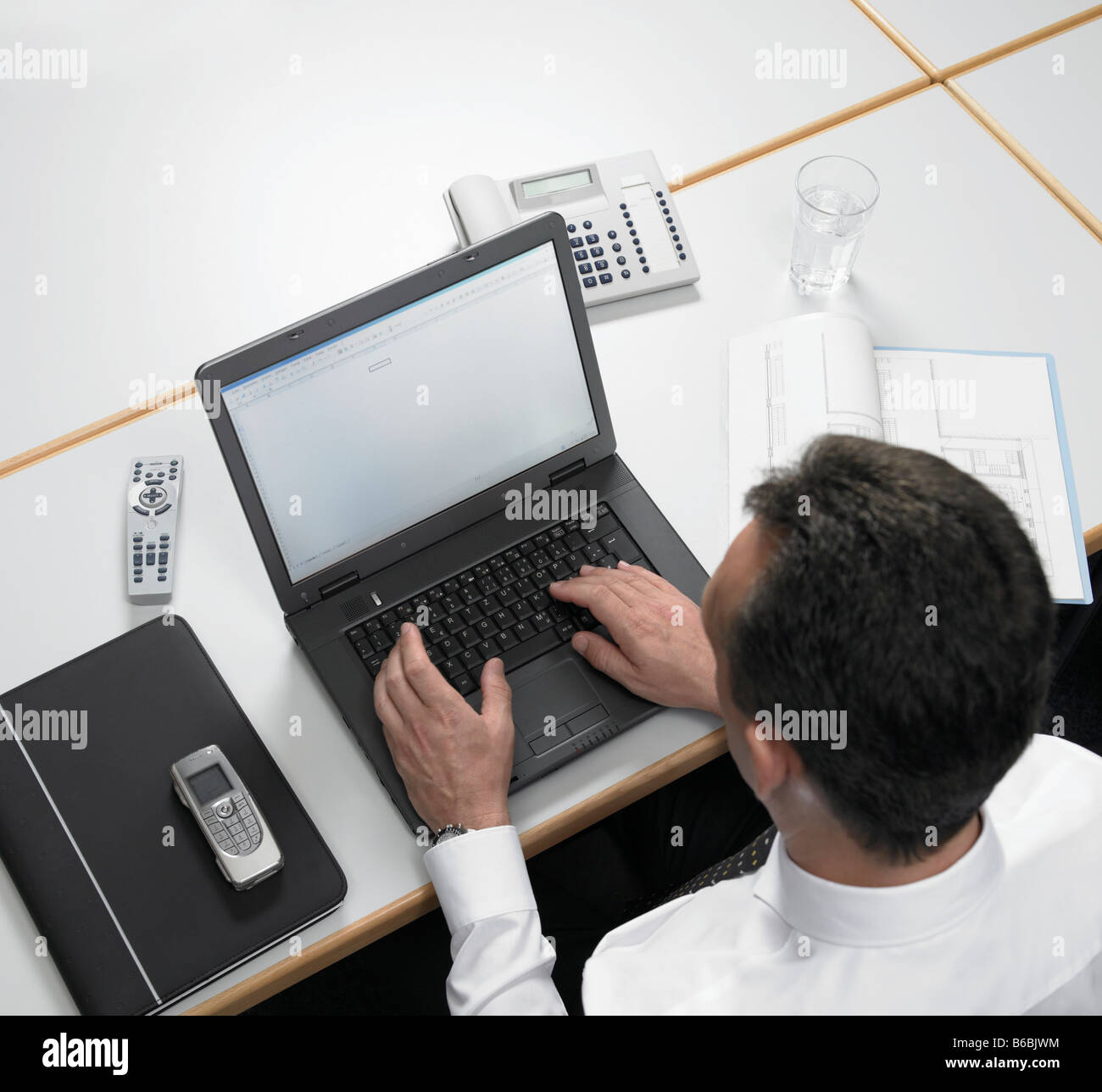 Man working on laptop Stock Photo
