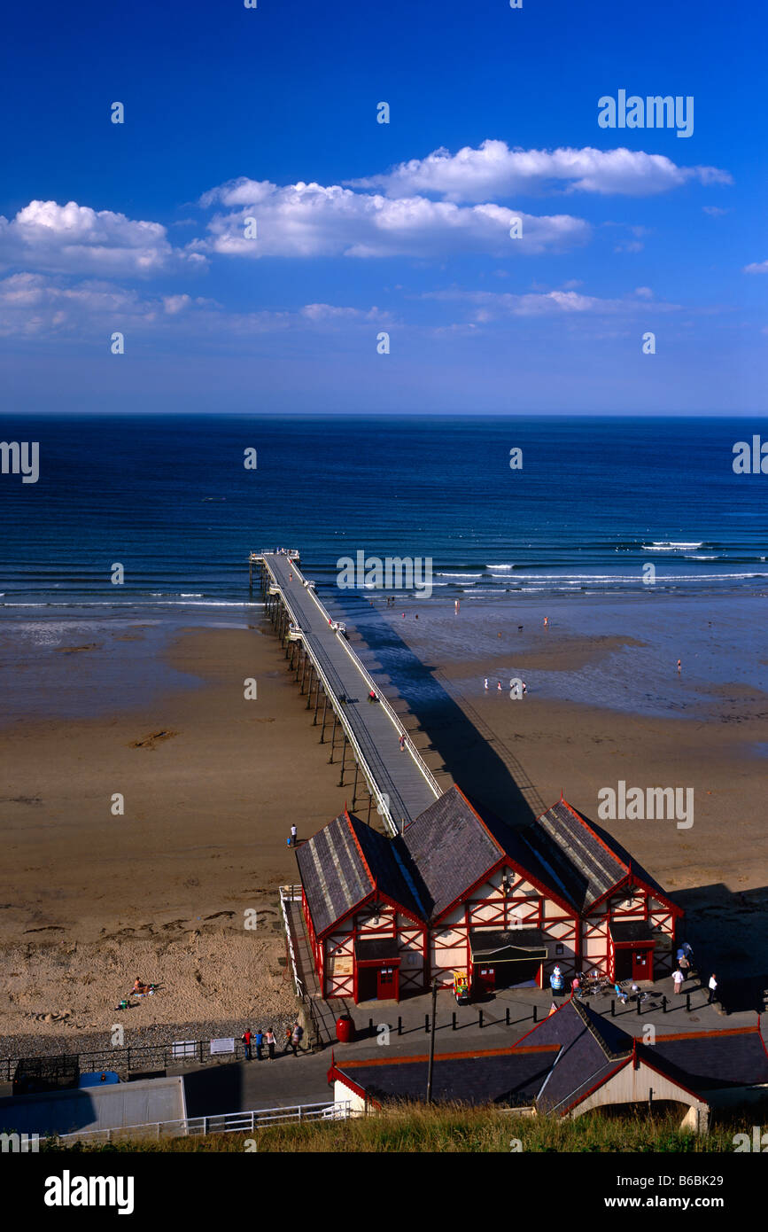 Summer view of the incline of the Saltburn Cliff Railway and pier