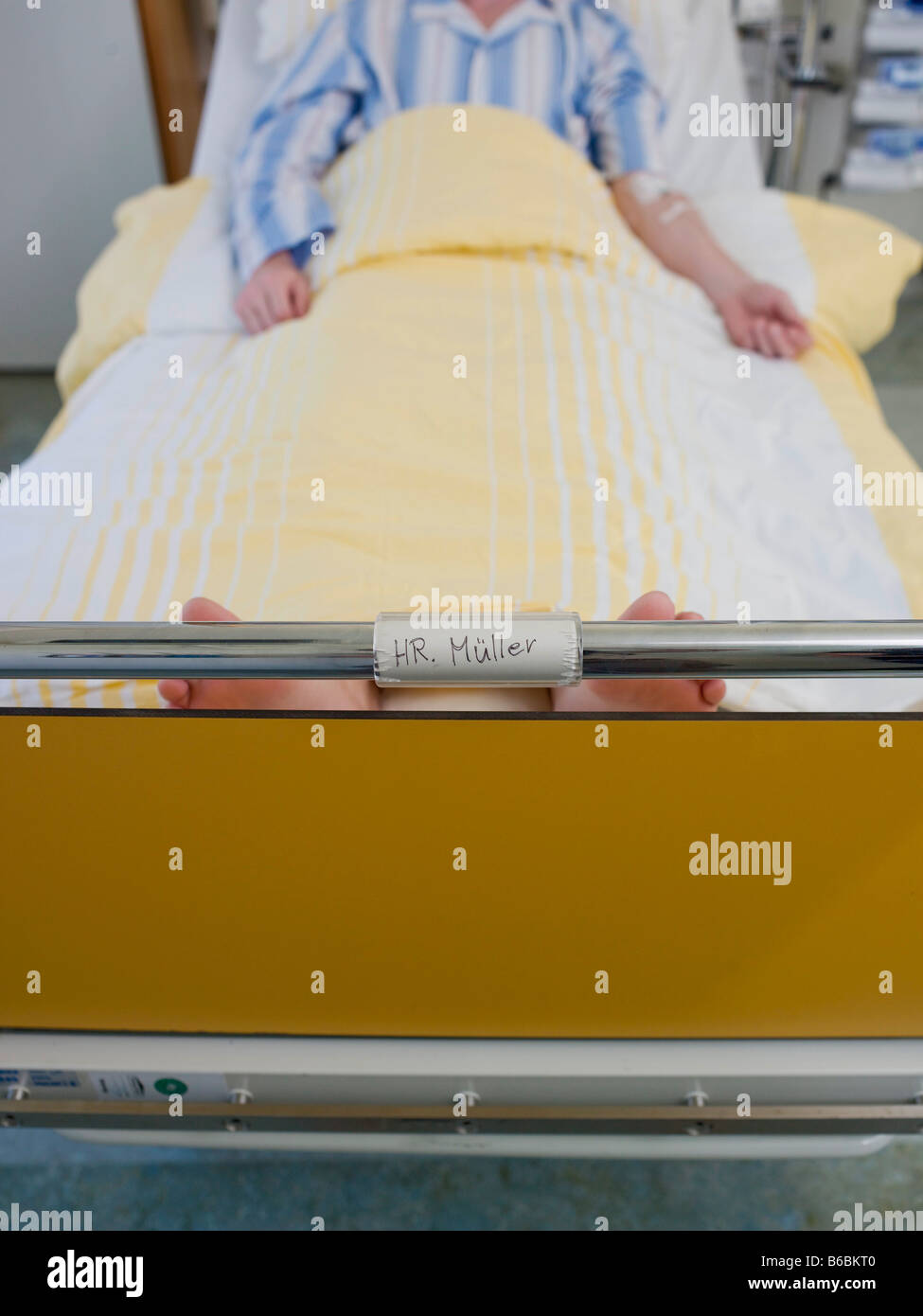 Patient lying in hospital bed Stock Photo Alamy