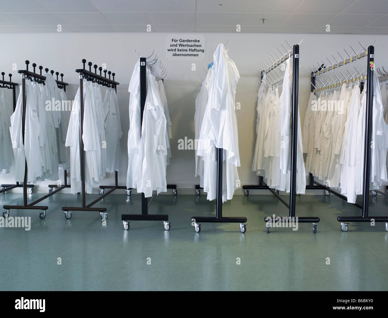 Clothes hanging on hangers Stock Photo