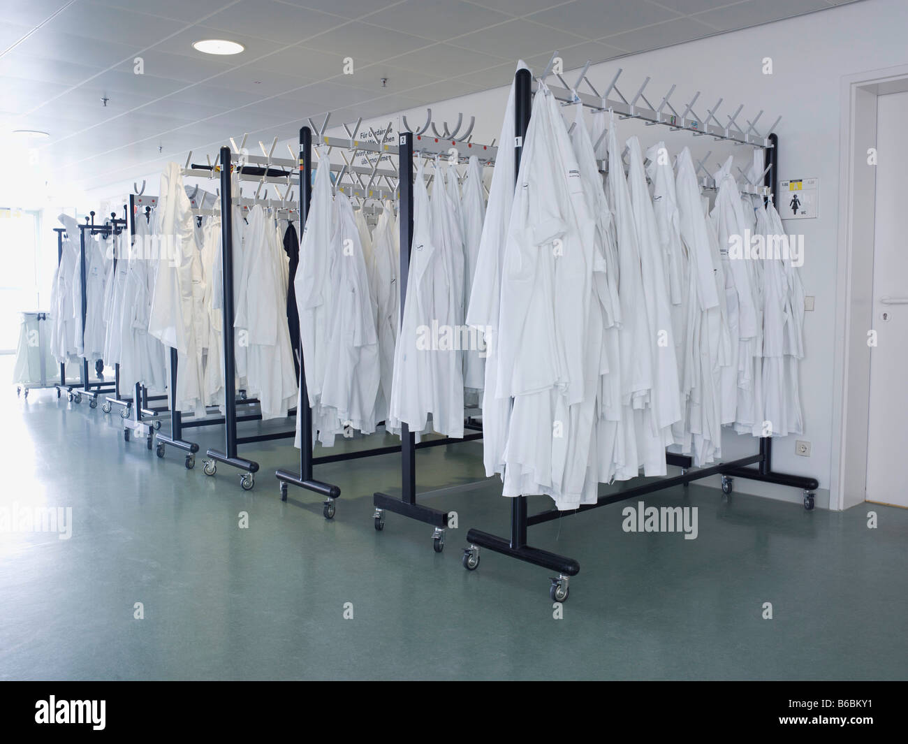 Clothes hanging on hangers Stock Photo