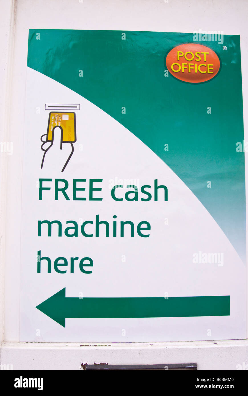Free cash machine here sign at Post Office in Uk Stock Photo