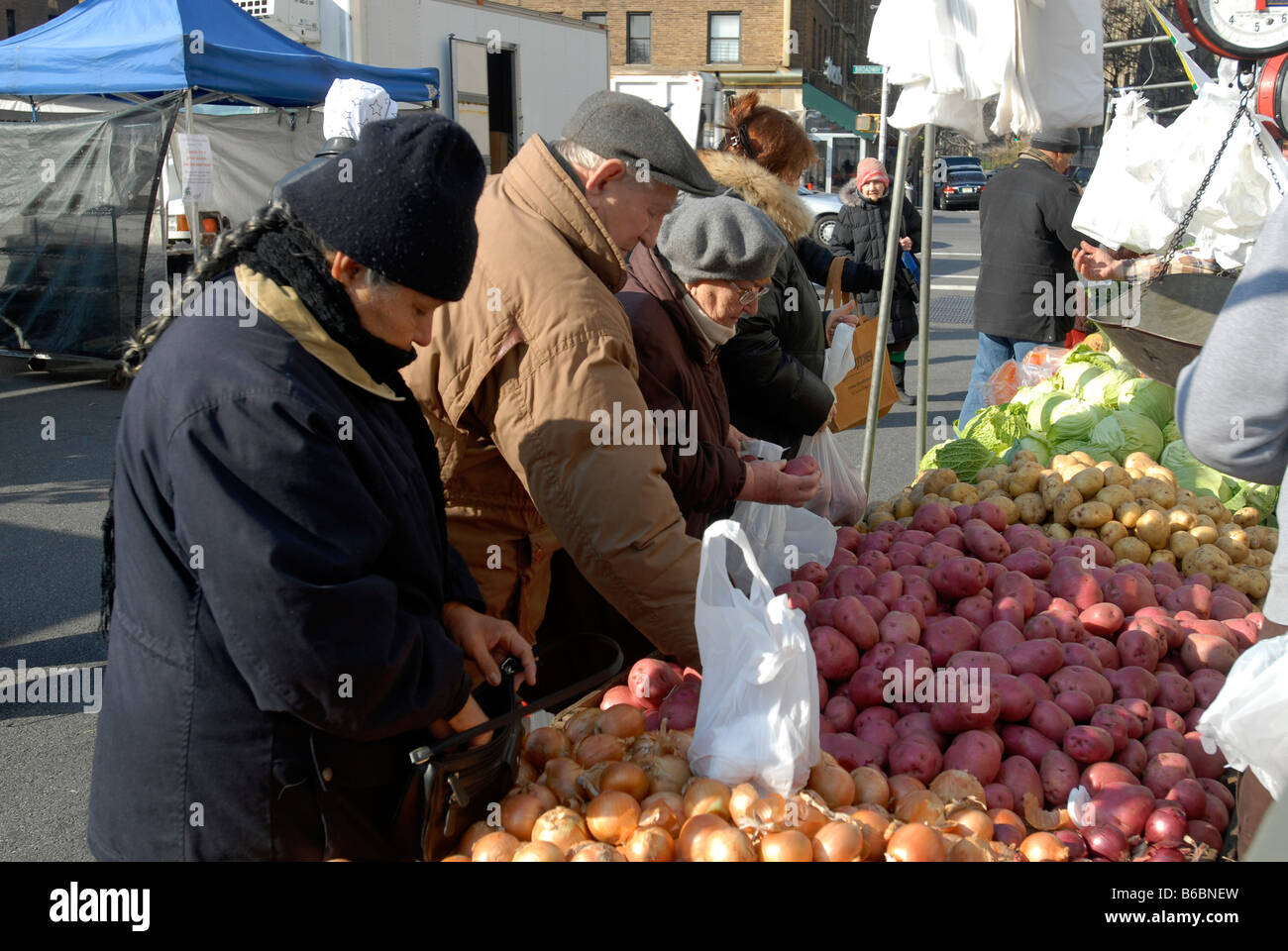 Shoppers buy produce at a Greenmarket in the Washington Heights neighborhood of New York Stock Photo