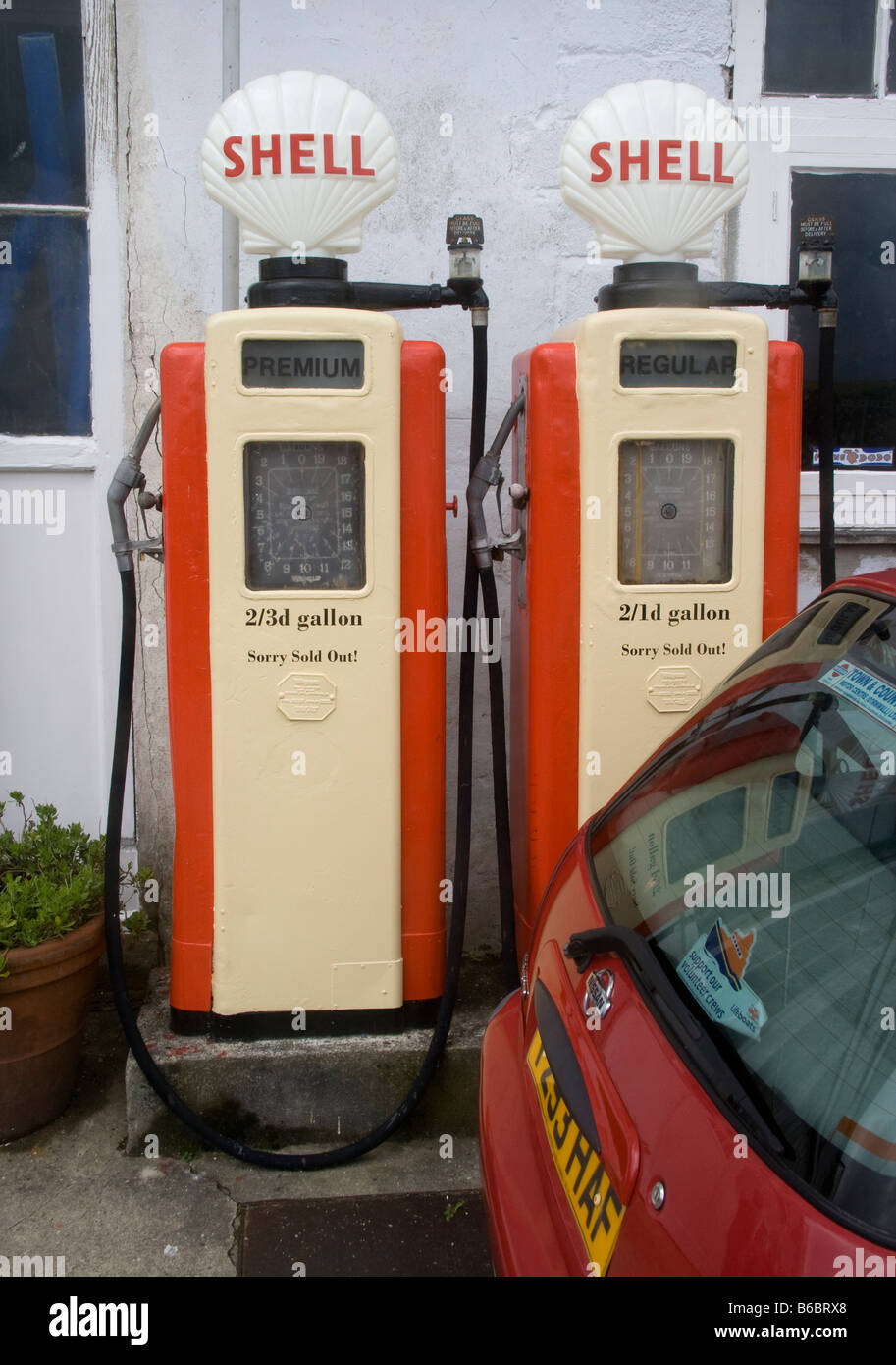 Old Shell petrol pumps at a redundant petrol station in St.Mawes