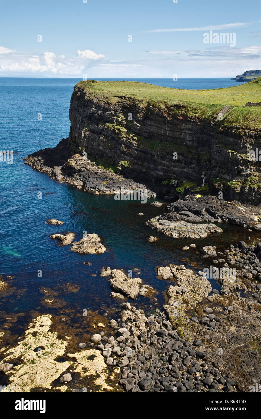 Basalt cliffs on the North Antrim coast seen from Dunluce Castle near Portballintrae, County Antrim, Northern Ireland Stock Photo