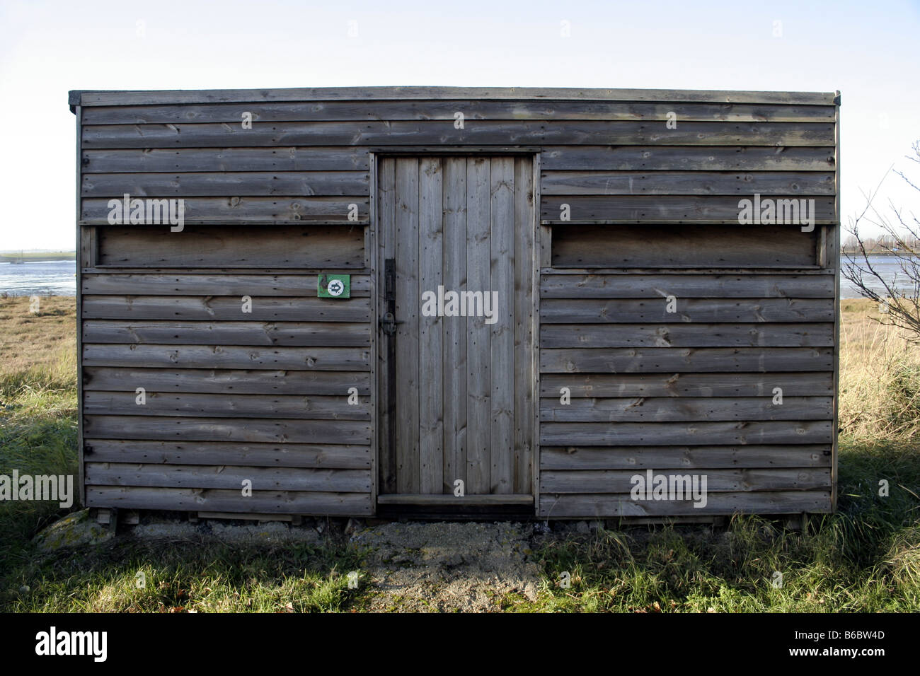 Wooden Bird Watching Hut on Northey Island, Essex,UK. This is a National Trust Area. Stock Photo