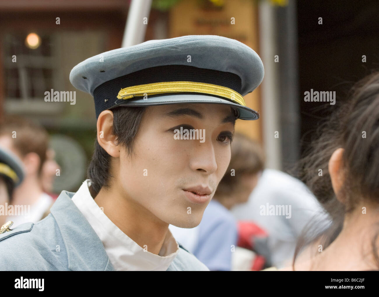 A street artist in fancy dress on Edinburgh High Street during the