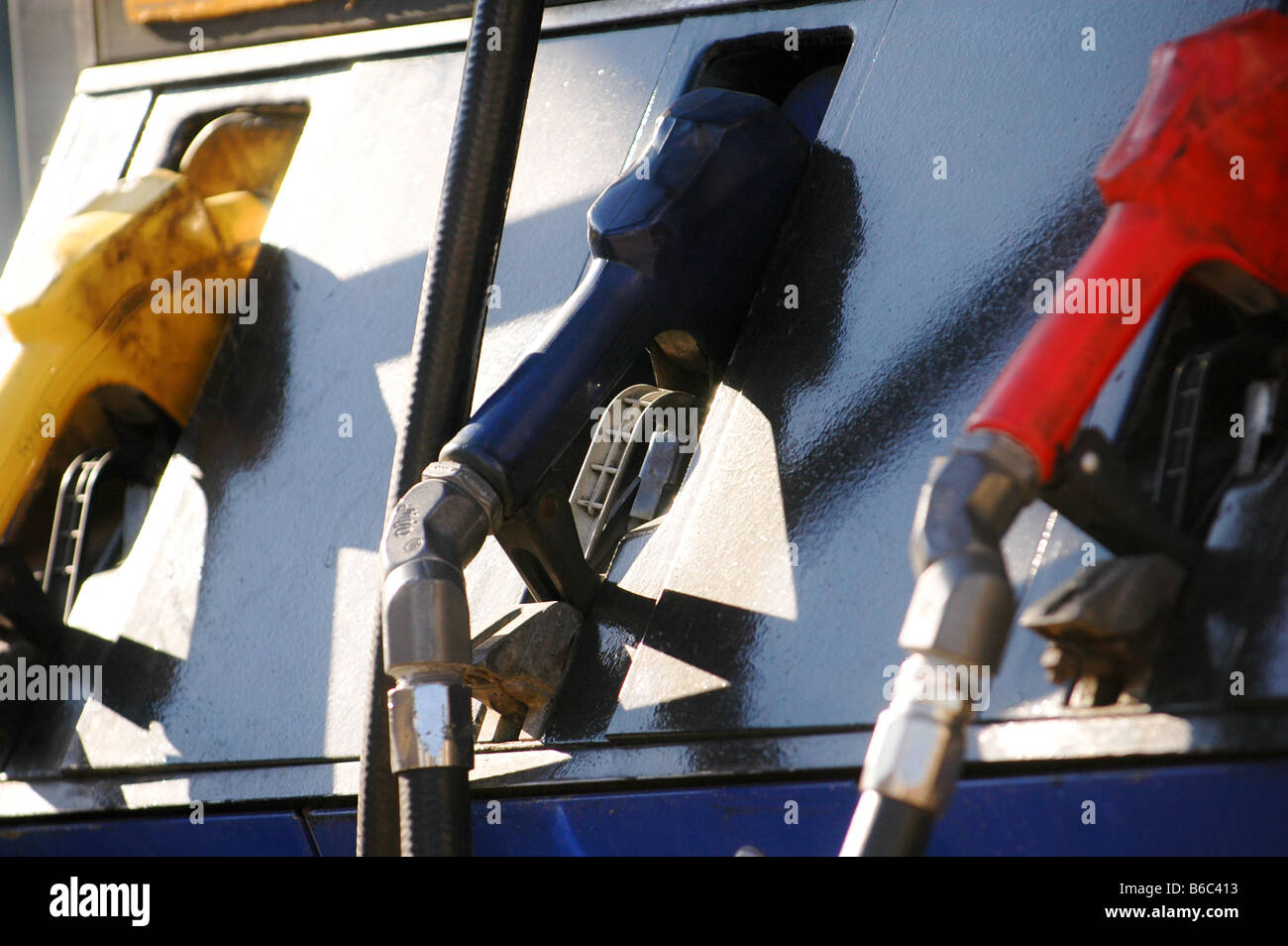 Gas station pumps with various grades of fuel. Stock Photo