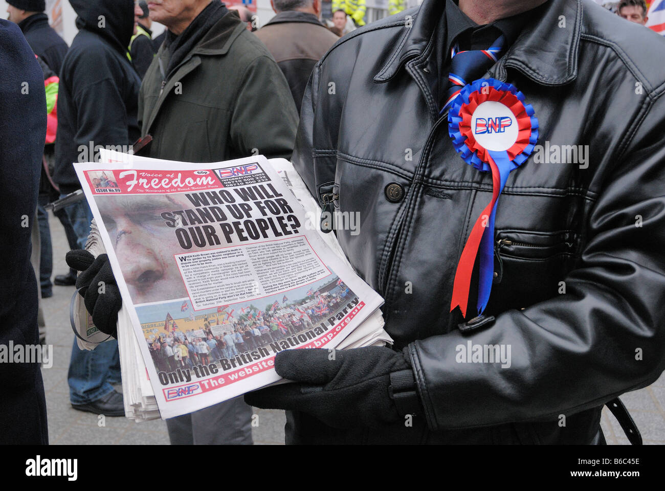 British National Party member handing out their 'Voice of Freedom' newspaper in Liverpool 29th. November 2008 Stock Photo