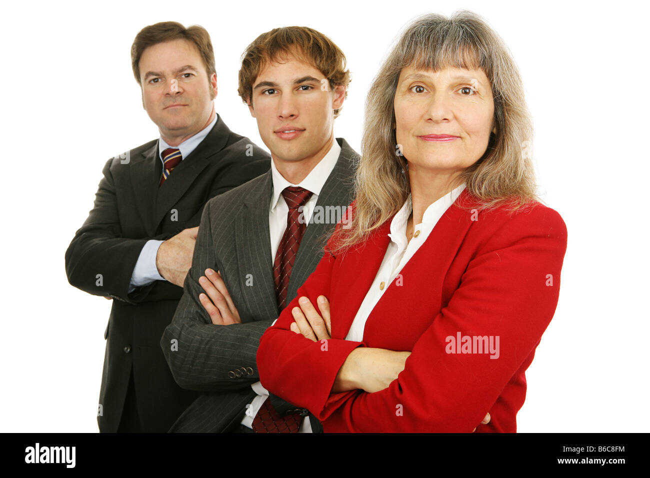 Business woman and her team with arms crossed looking serious Isolated ...