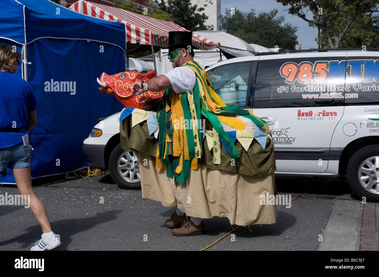 member of Irish minstrel team in costume at Downtown Arts Festival