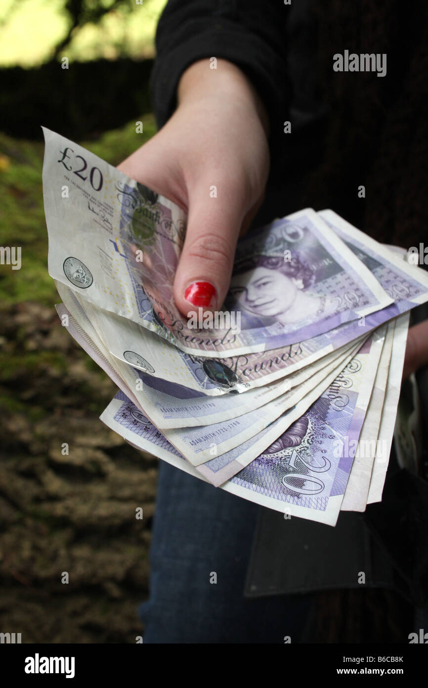 A Female Holding Some English Sterling Stock Photo Alamy A Female Holding Some English Sterling Stock Photo Alamy