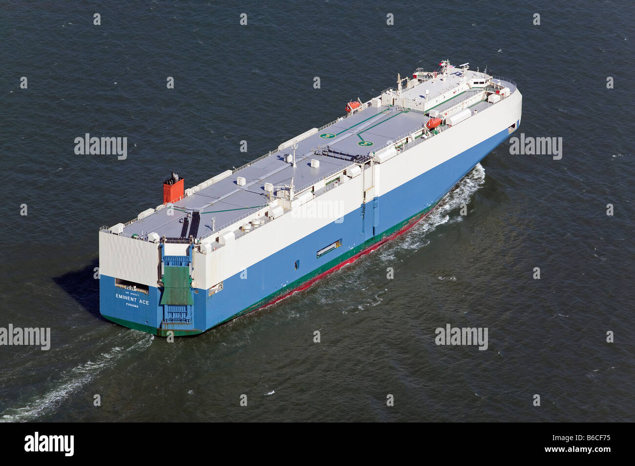 aerial view above Eminent Ace Panama registered automobile vehicle carrier merchant ship built by Mitsubishi Stock Photo