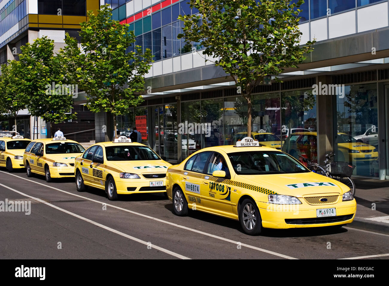Melbourne Taxis /  Taxis wait at a rank in Melbourne Victoria Australia. Stock Photo