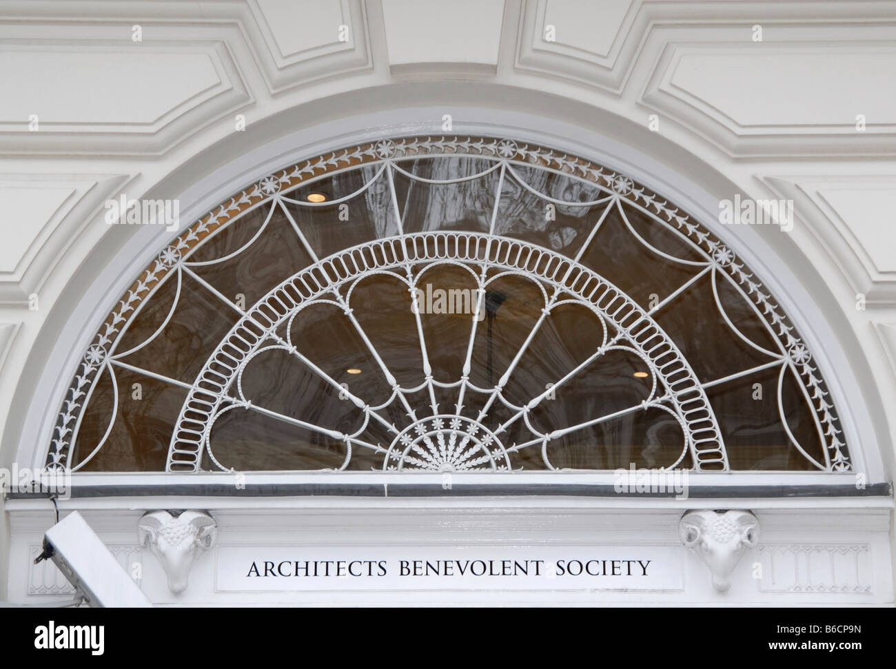 Beautiful, delicate and elaborate example of a late Georgian fanlight, Portland Place, London, England Stock Photo