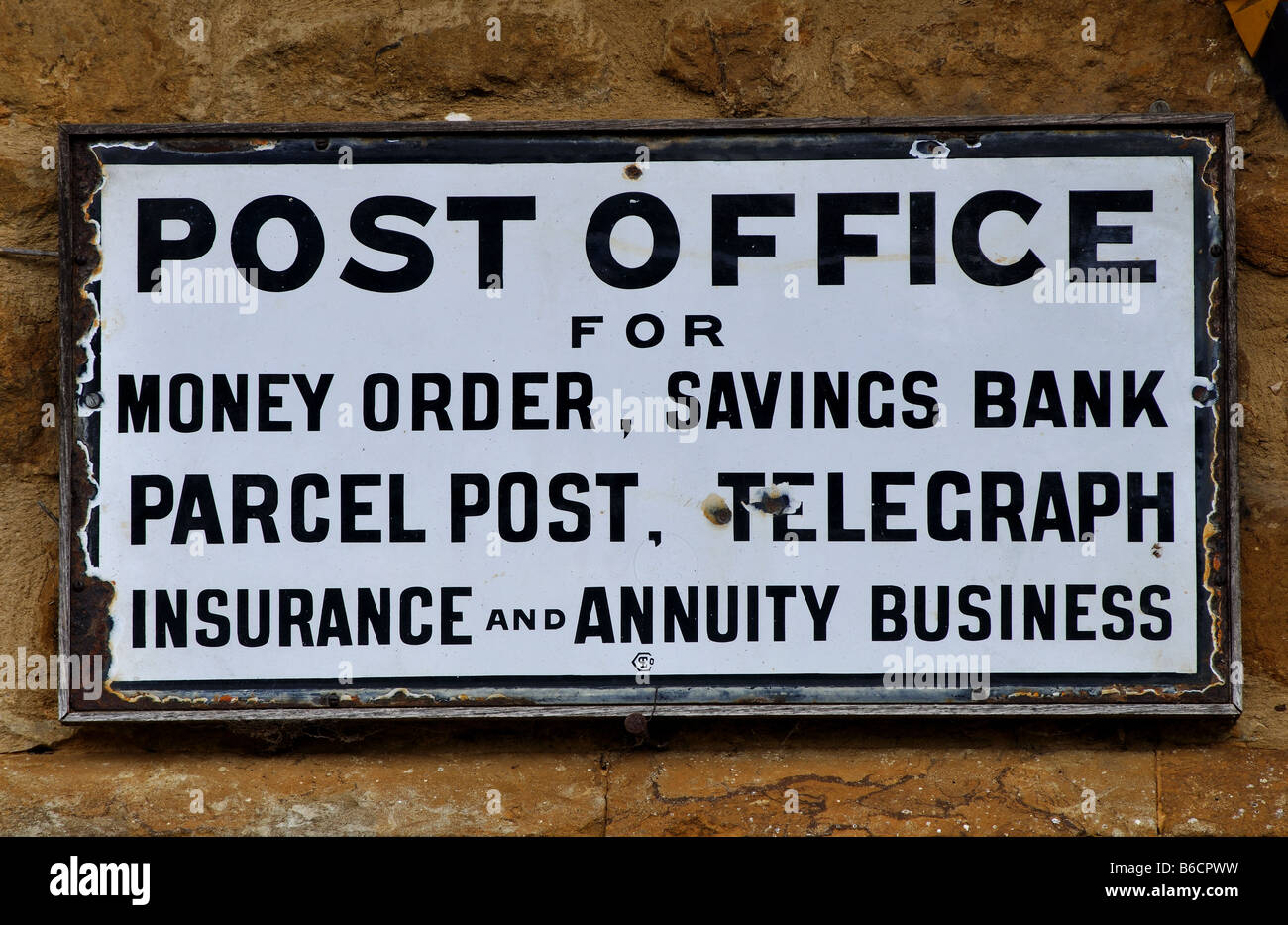 Post Office sign on shop, Great Tew, Oxfordshire, England, UK Stock Photo