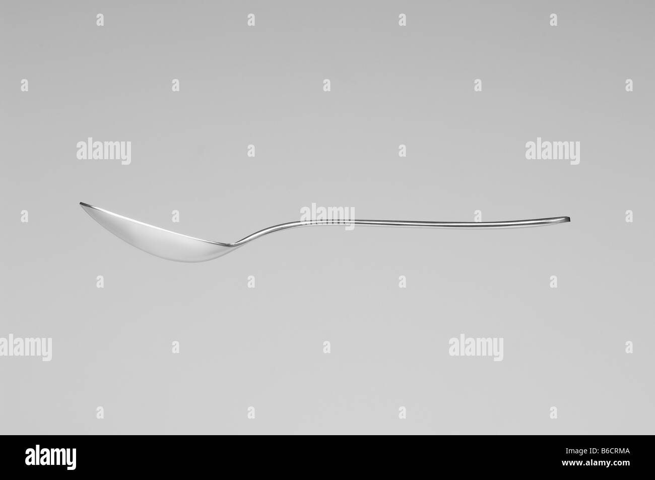 Side profile of spoon Stock Photo Alamy