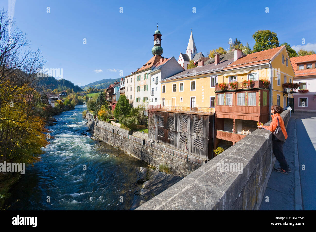Houses along river, Mur, Murau, Styria, Austria Stock Photo