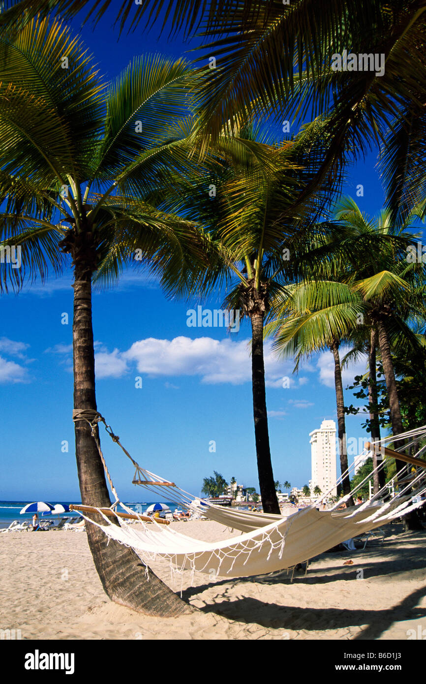 Hammocks on beach, Isla Verde Beach, San Juan, Puerto Rico Stock Photo