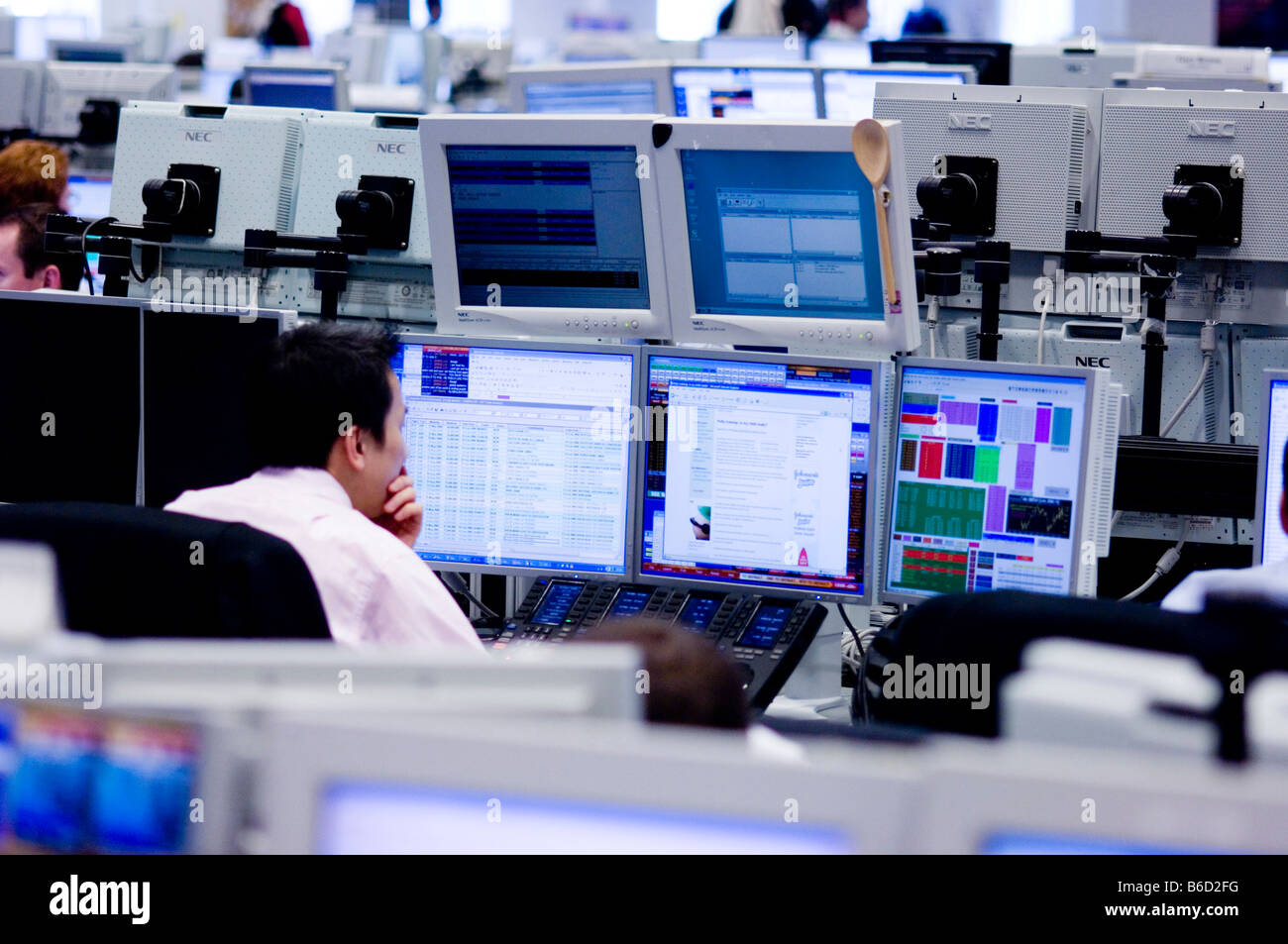 a trader pictured on the trading floor of Deutsche Bank in the City Stock Photo - Alamy