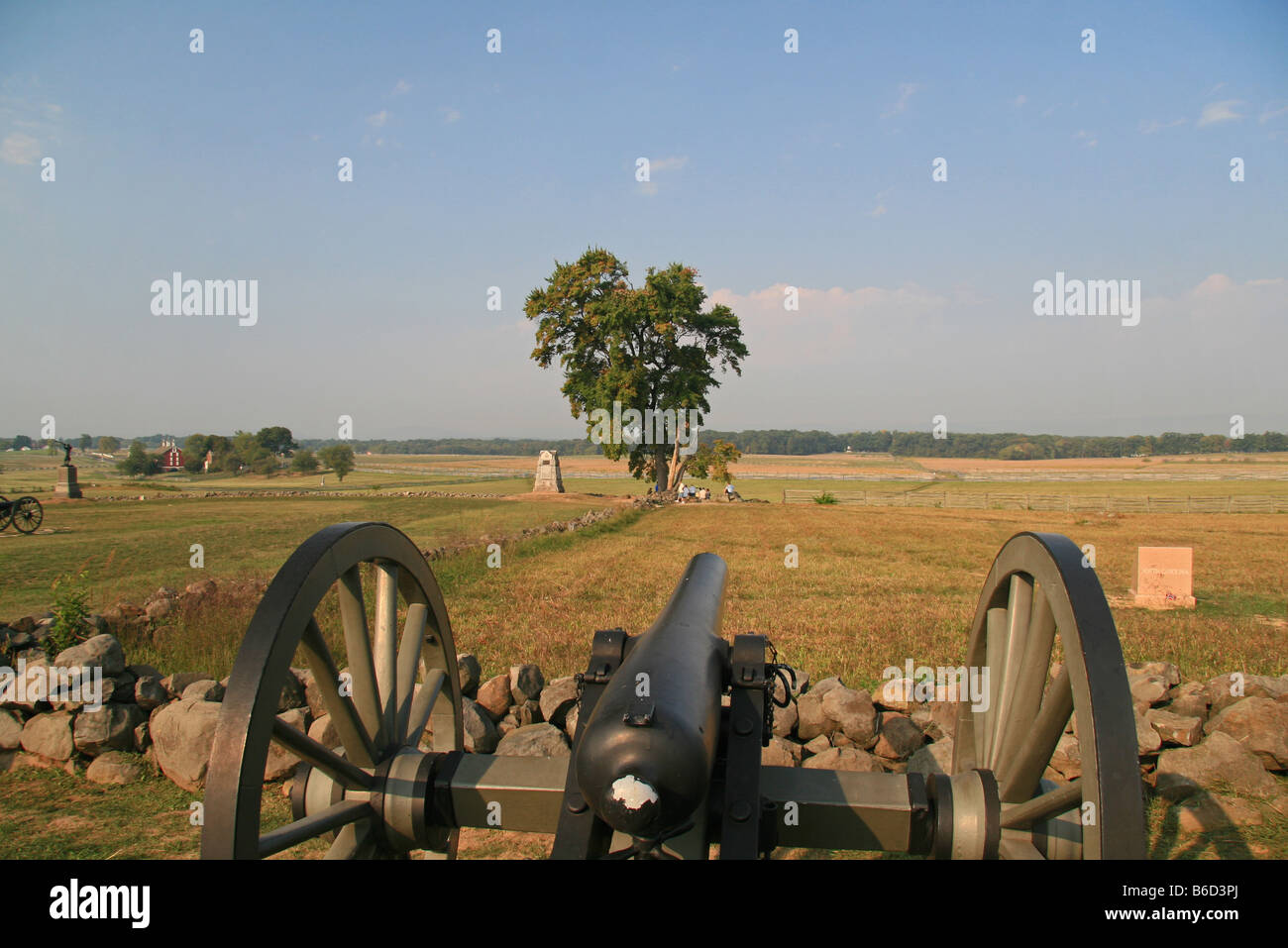 Looking along the barrel of a cannon towards Picketts Charge, on Cemetery Ridge, Gettysburg National Military Park. Stock Photo