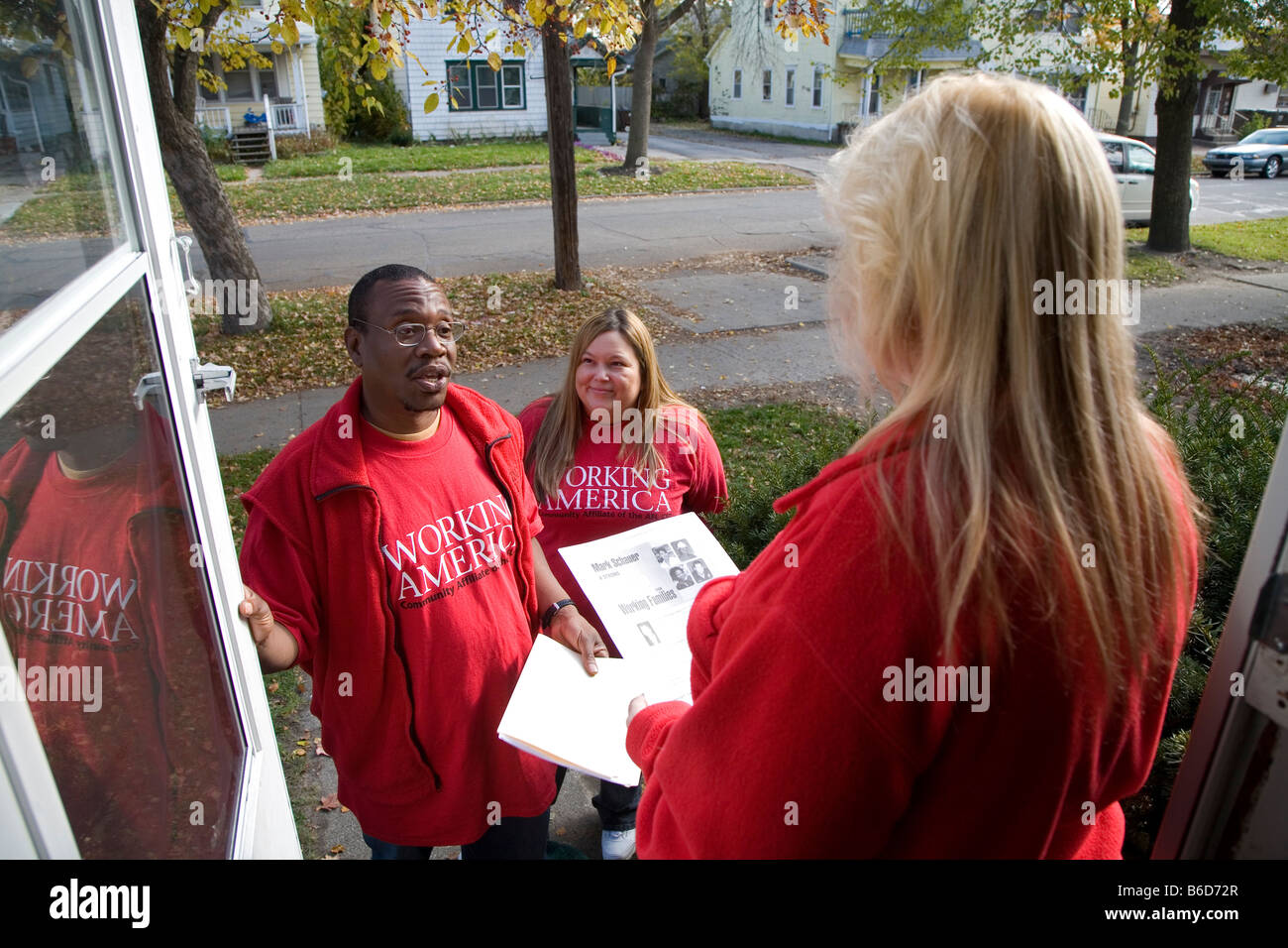 Organizers Campaign Door-to-Door Before Election Stock Photo