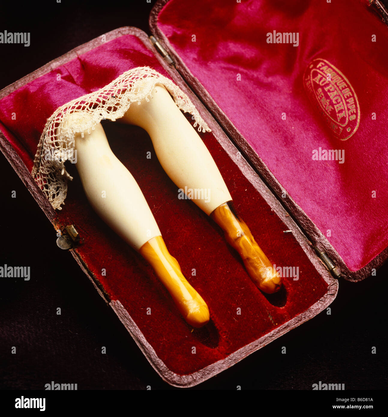 Meerschaum pipes carved as a pair of legs Stock Photo