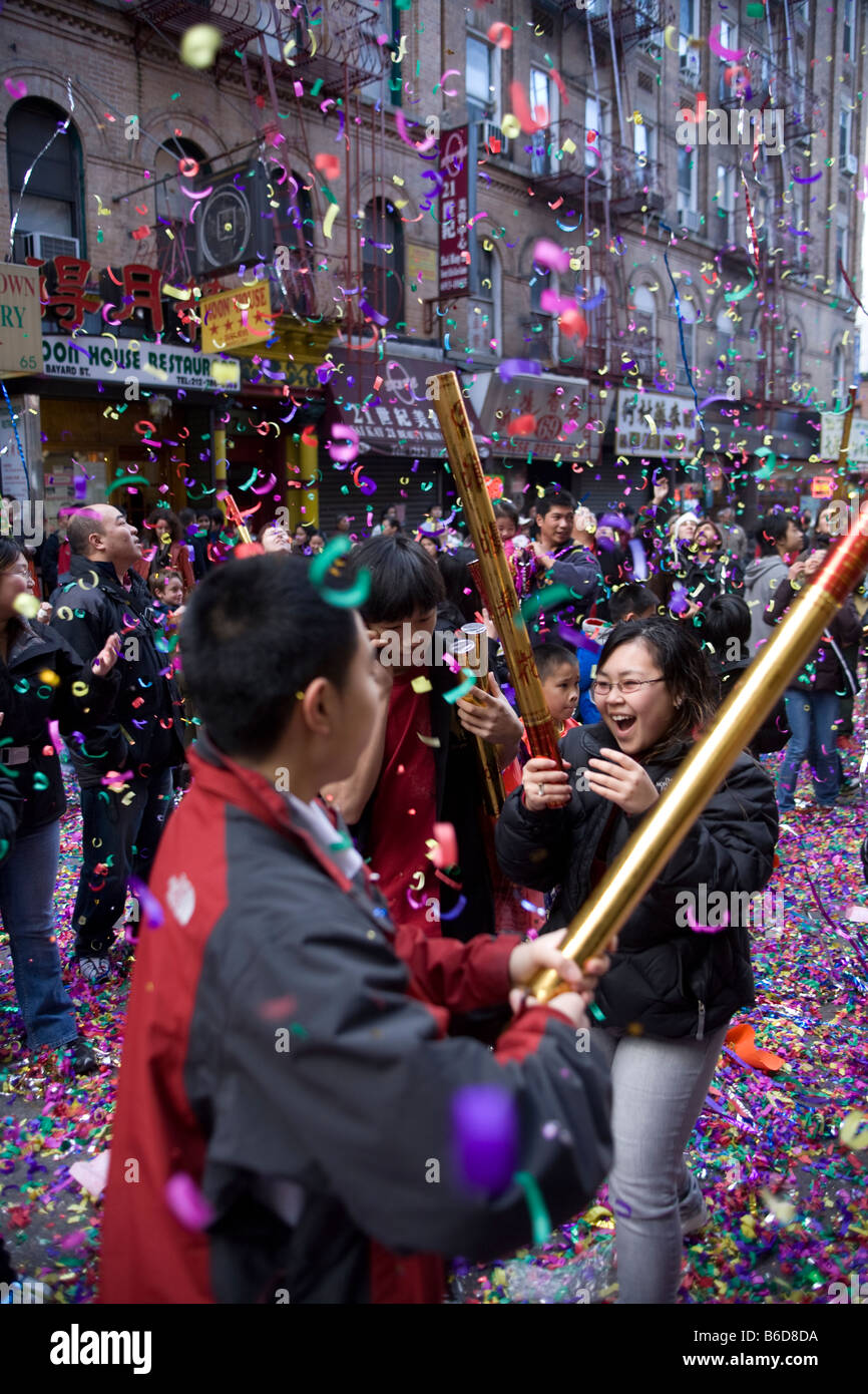 Celebrants at Chinese New Year in Chinatown New York City bring in the Year of the Rat in 2008 Stock Photo