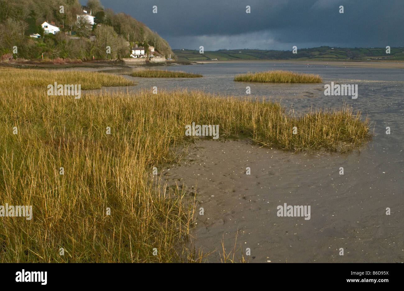 Dylan Thomas Boat House in Laugharne Carmarthenshire across the marshes of the Taf Estuary Stock Photo