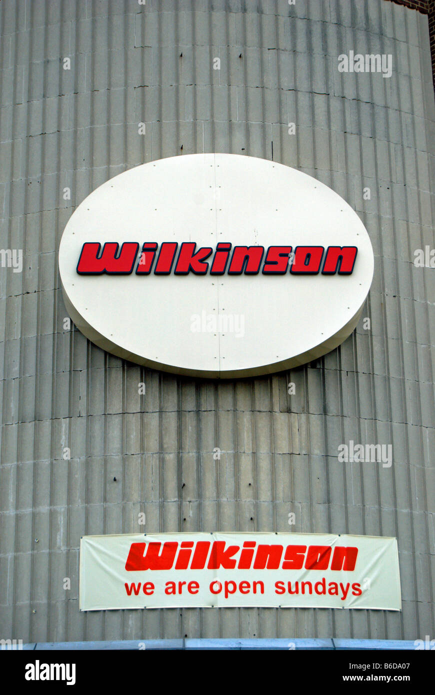 logo of wilkinson supermarket with banner stating we are open sundays
