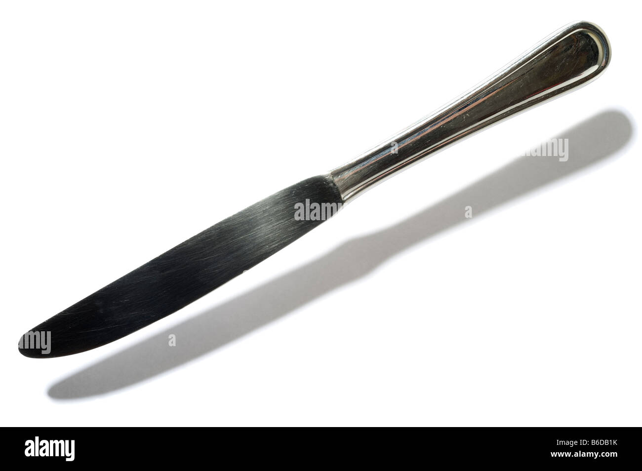 Cutlery knife and shadow Stock Photo