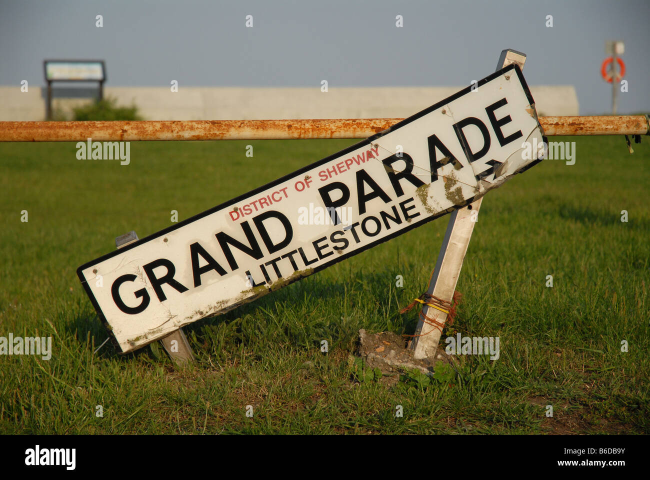 A street sign saying Grand Parade in disrepair Stock Photo