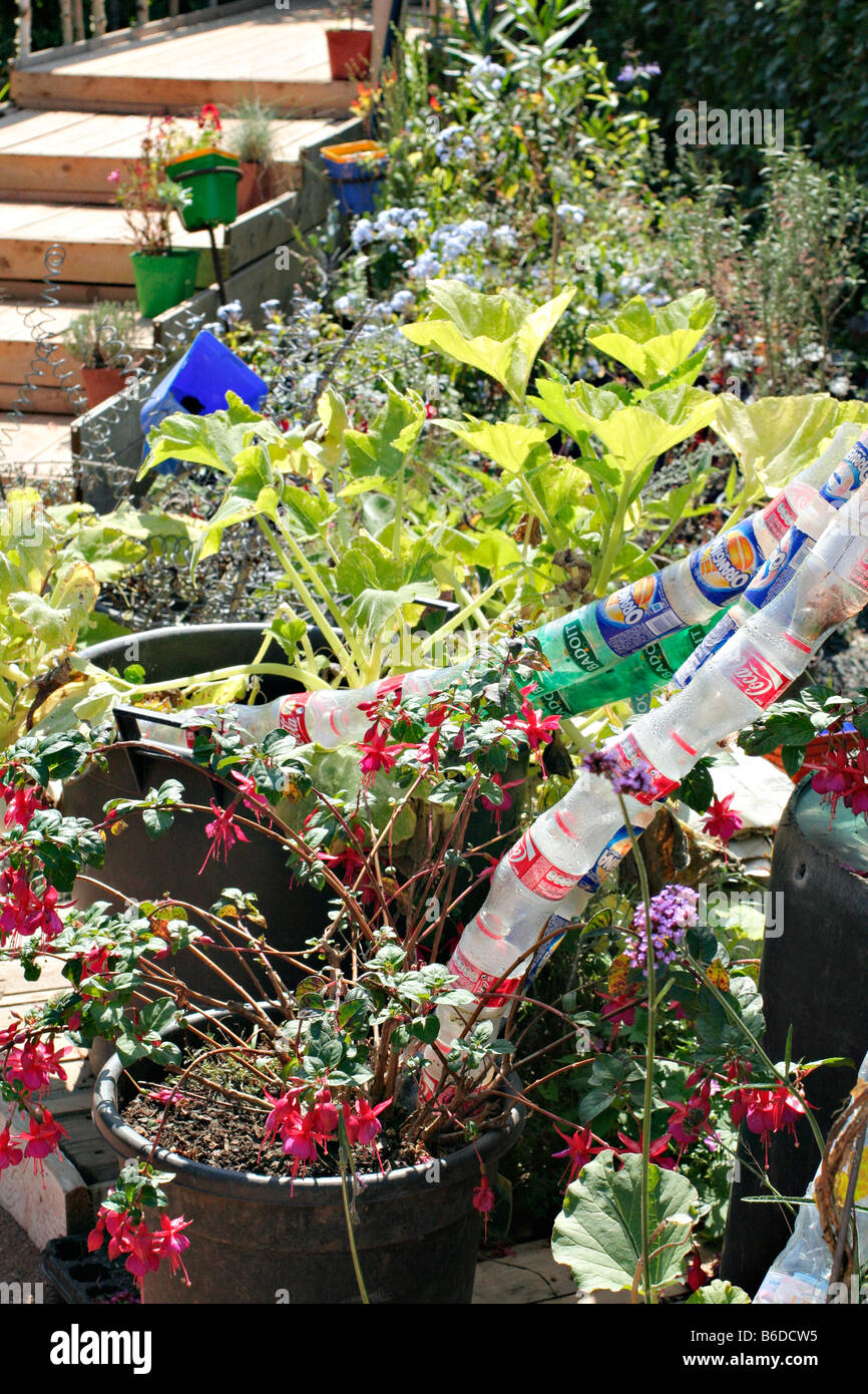WATERING SYSTEM IN LE JARDIN POUBELLE CHRISTINE AND MICHEL PENA USING RECYCLED MATERIALS AT CHAUMONT SUR LOIRE 2008 Stock Photo