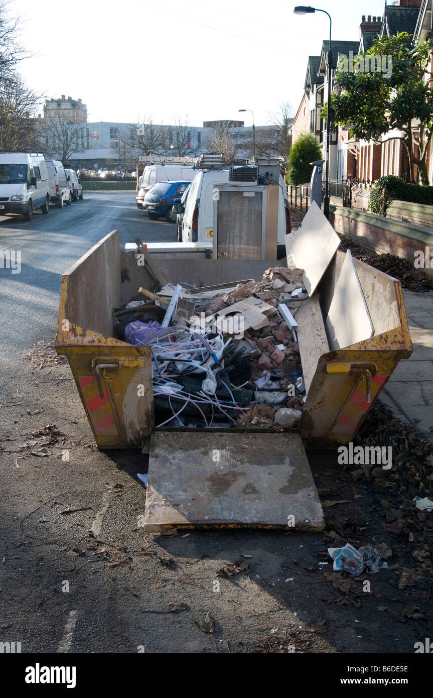 skip trash rubbish junk scrap throwaway dumpster can waste dispose disposal dump refuse disposal bin landfill uk tax Stock Photo