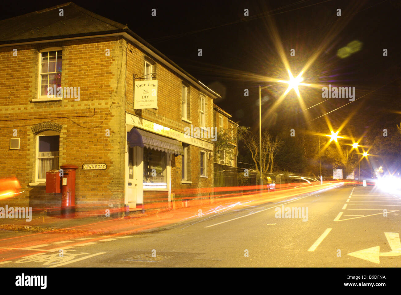 Corner Shop with Traffic Trails Stock Photo Alamy