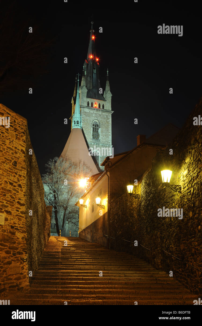 The Žižka's gate with view on Gothic st. Peter and Paul Church in the old town of Čáslav, Czech Republic. Stock Photo
