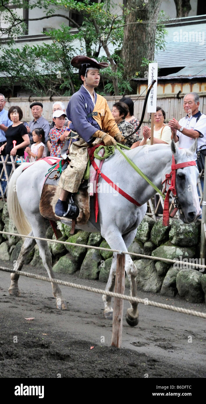 An archer parades on their horse before the horseback archery (Yabusame
