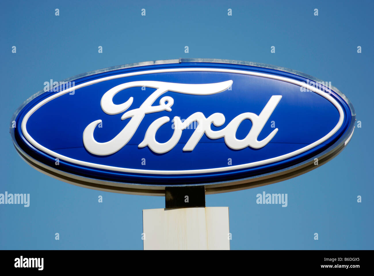 The famous Ford logo above a car dealership struggling to sell