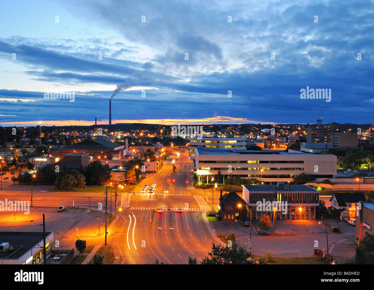 Part of downtown Sudbury, Ontario, Canada with the water tower and the Superstack in the background Stock Photo