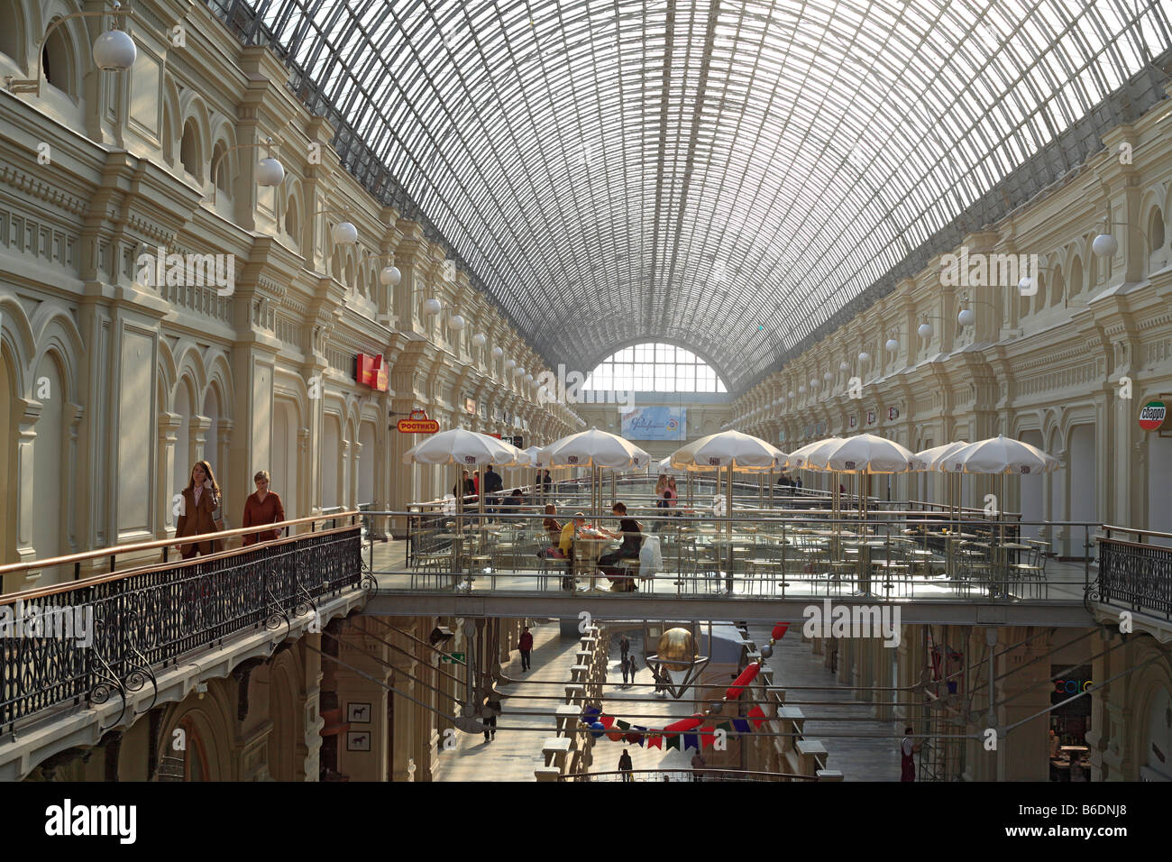 Interior with glass roof of GUM department store (19 century building ...