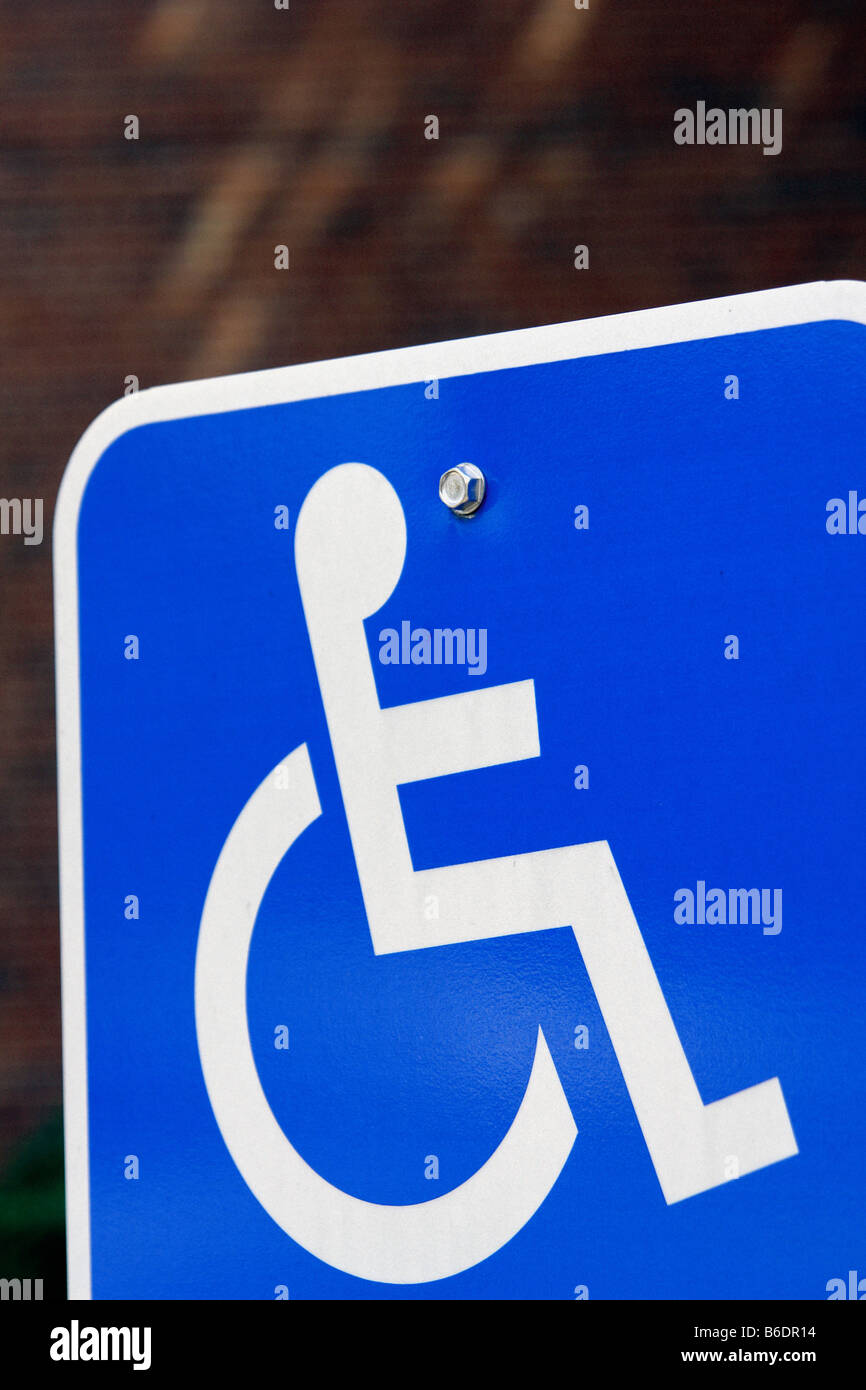 Urban Scene of a Handicapped Parking Sign in a Parking Lot Copy Space Stock Photo