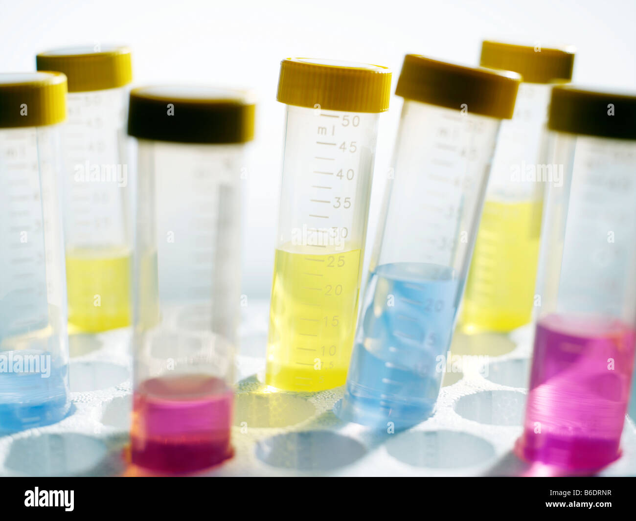 Sample vials. Liquids of different colours stored in sample vials Stock