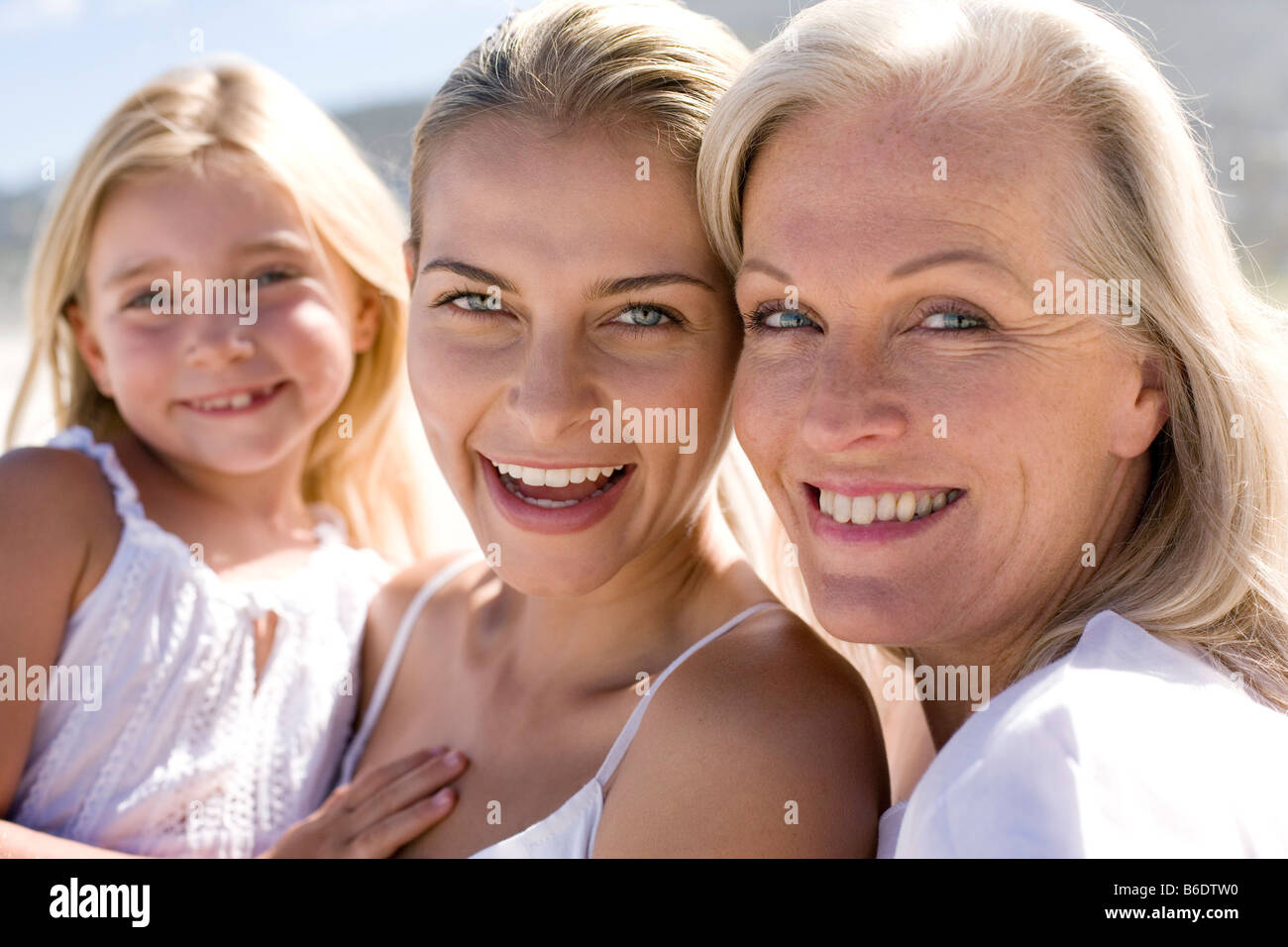 Young girl with her mother and grandmother Stock Photo - Alamy
