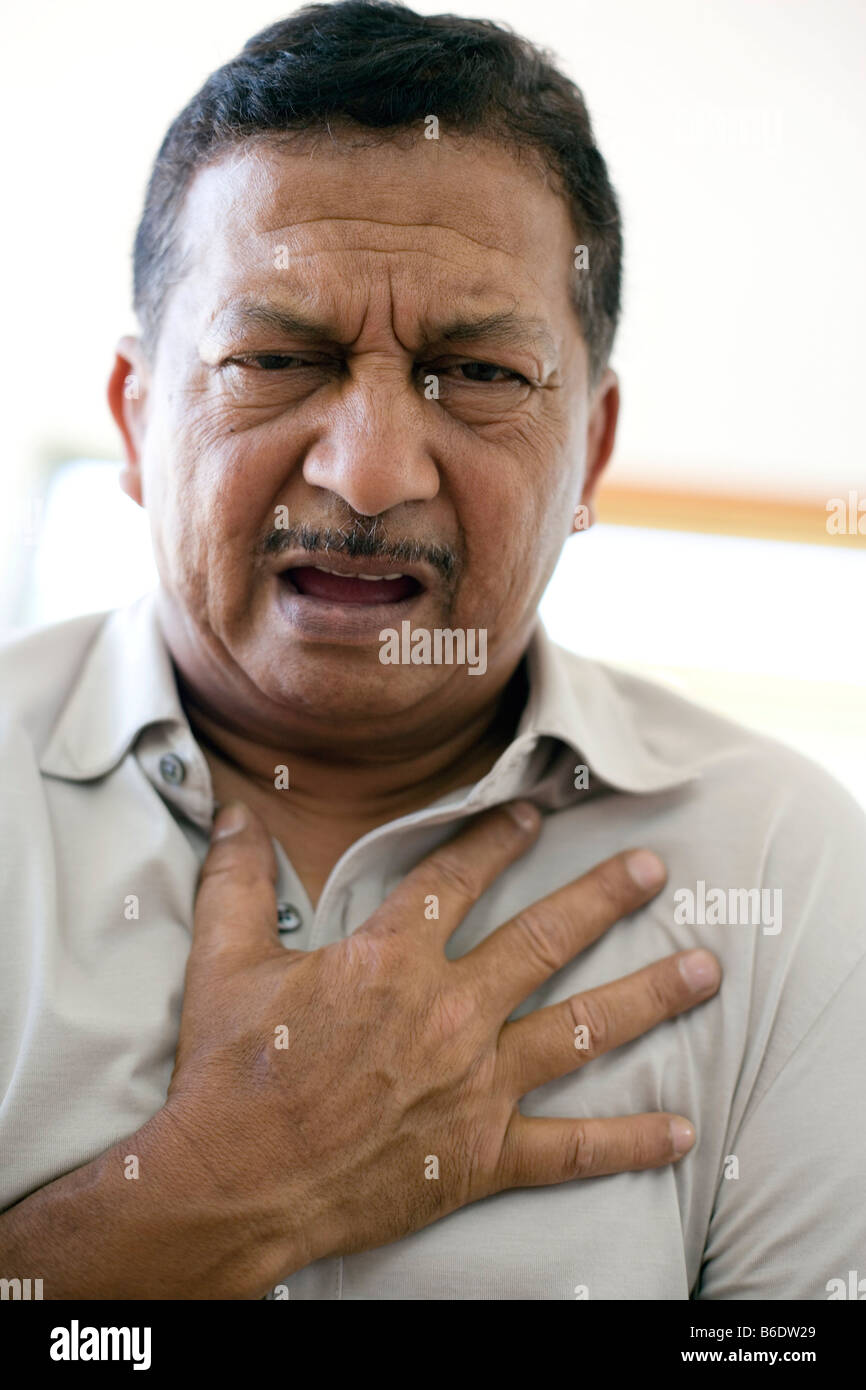 Heart attack clutching chest hires stock photography and images Alamy