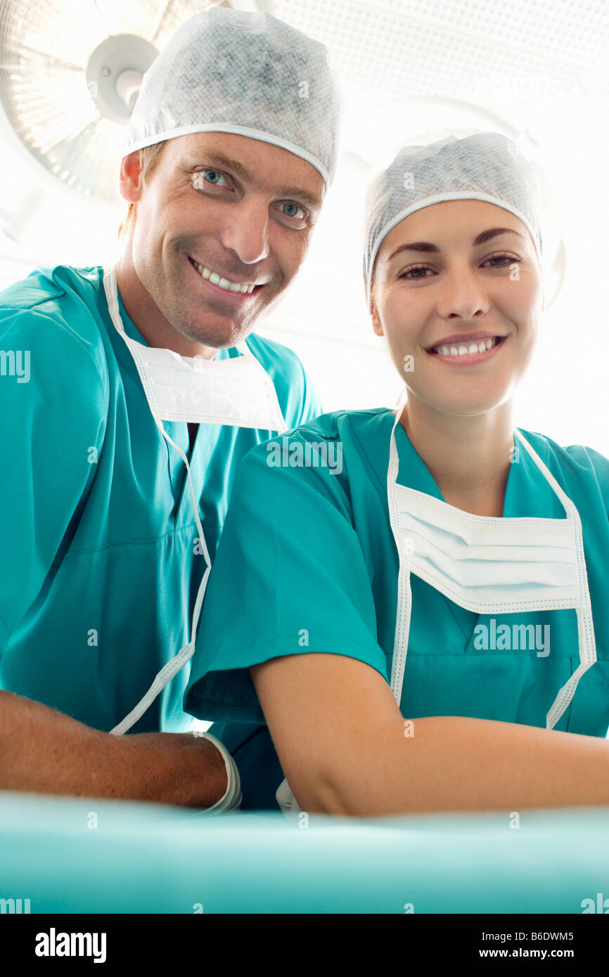 Surgical team in an operating theatre. Stock Photo