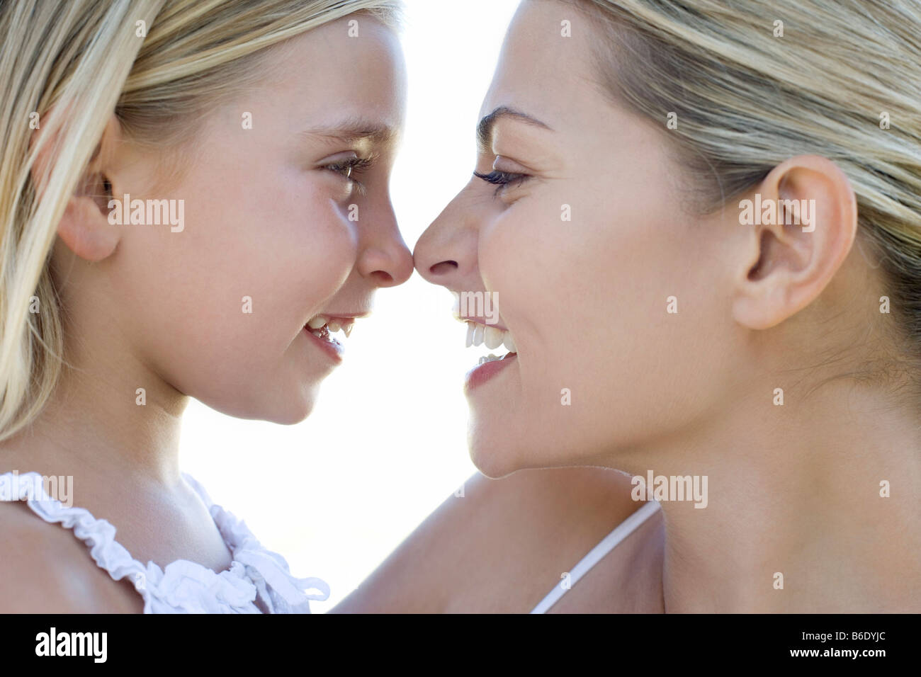 Mother and daughter rubbing noses Stock Photo Alamy