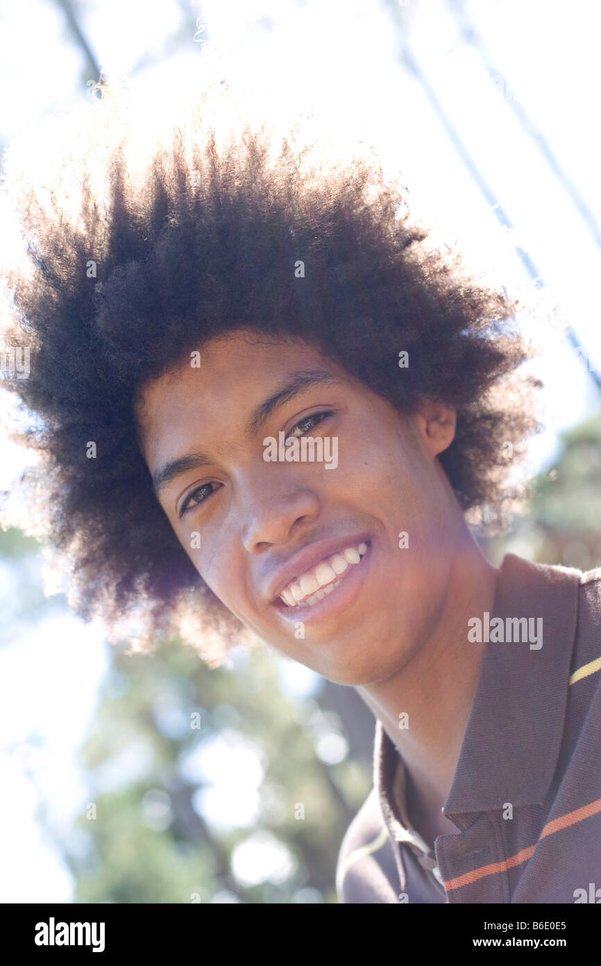Teenage black boy smiling face hi-res stock photography and images - Alamy