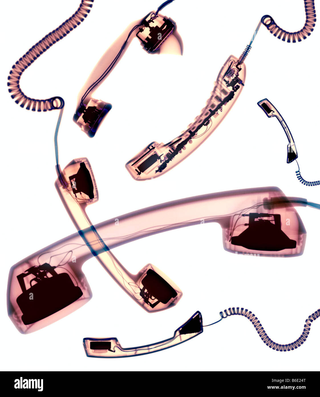 Coloured X-ray of telephone handsets Stock Photo